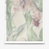 Wallpaper roll in abstract floral bushstroke design in sage green, lilac and blue. 