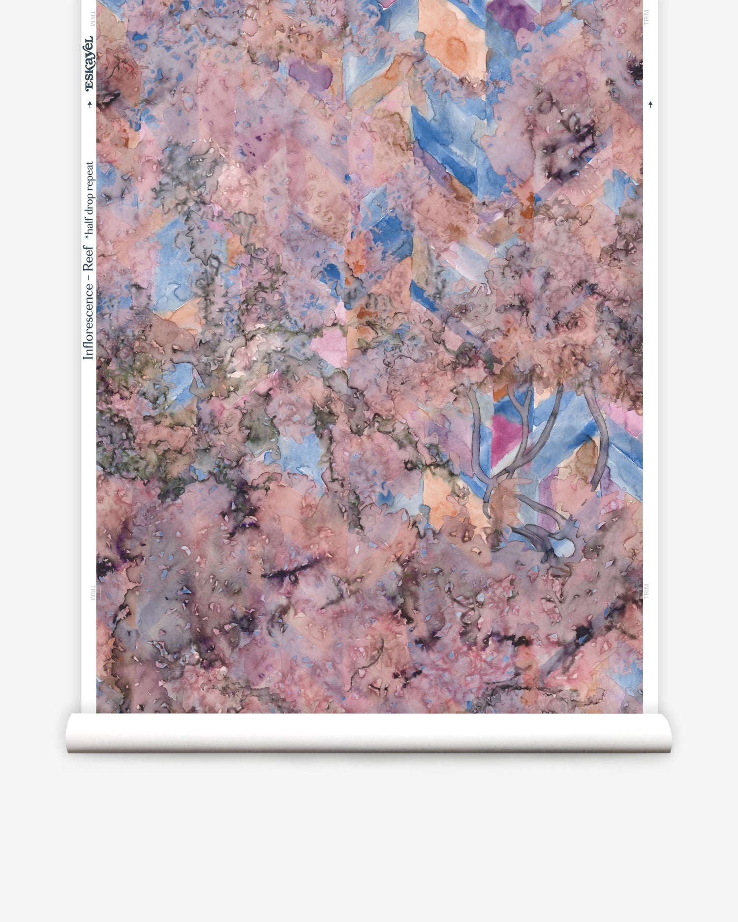 Wallpapper roll in a painterly tree print in pink, orange, gray and blue.