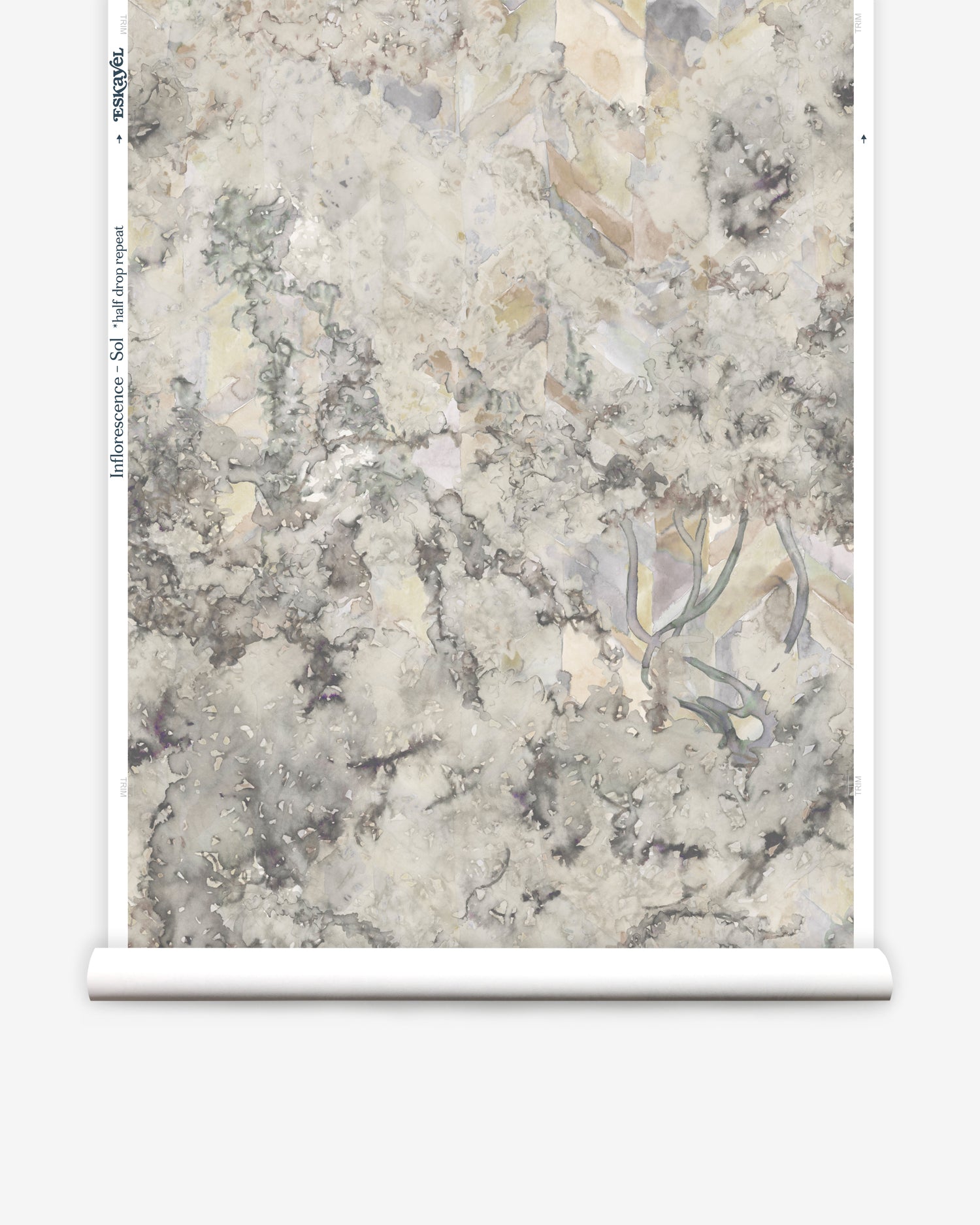 Wallpapper roll in a painterly tree print in gray, brown and purple.