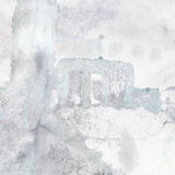 Detail of wallpaper mural in a minimal splatter print in shades of gray on a cream field.