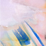 Wallpaper detail in an ombré watercolor print in shades of pink, purple and blue on a cream field.