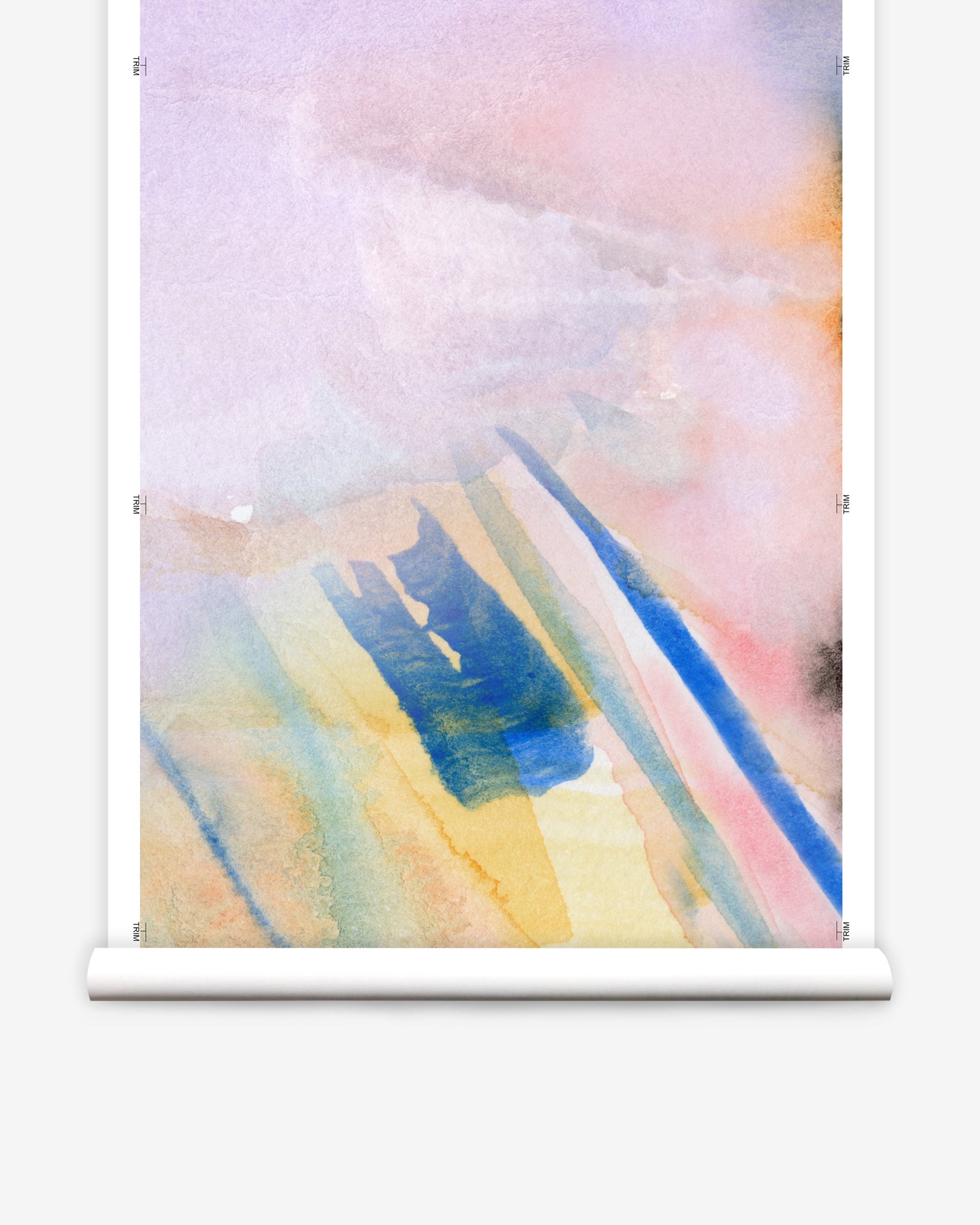 Wallpaper roll in an ombré watercolor print in shades of pink, purple and blue on a cream field.