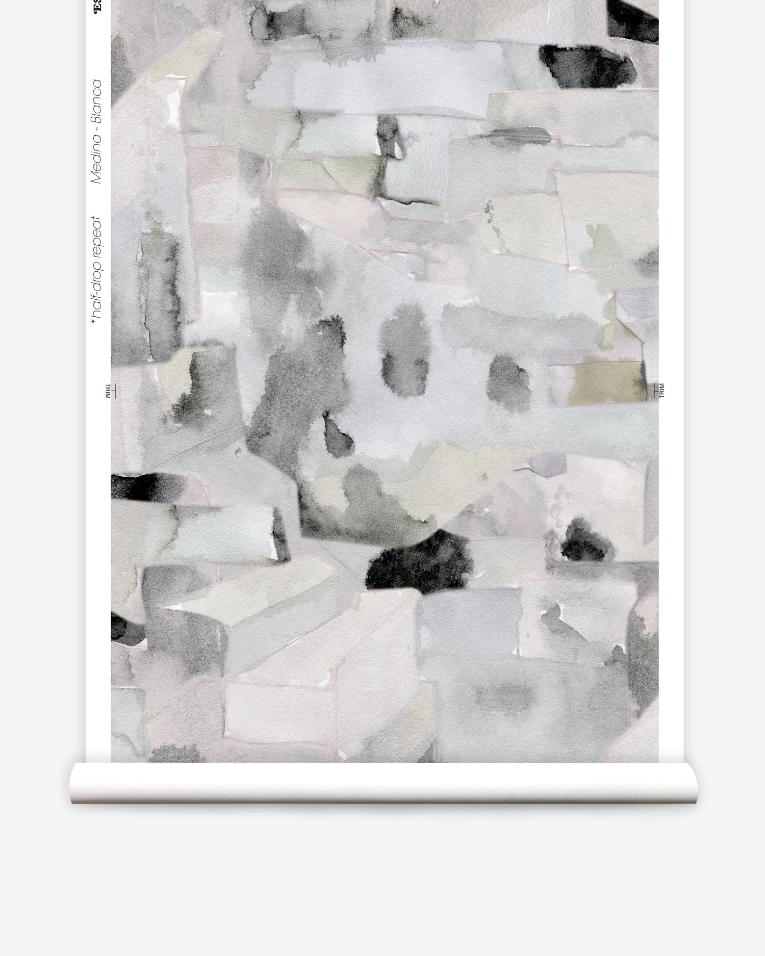 Wallpaper roll in a textural paint blotch print in shades of gray and blue on a light gray field.