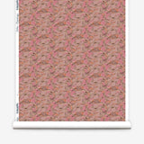 Wallpaper roll in an undulating abstract watercolor motif in pink, orange and grey. 