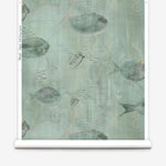Wallpaper roll in an watercolor oceanic fish pattern in sage green. 