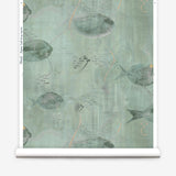 Wallpaper roll in an watercolor oceanic fish pattern in sage green. 