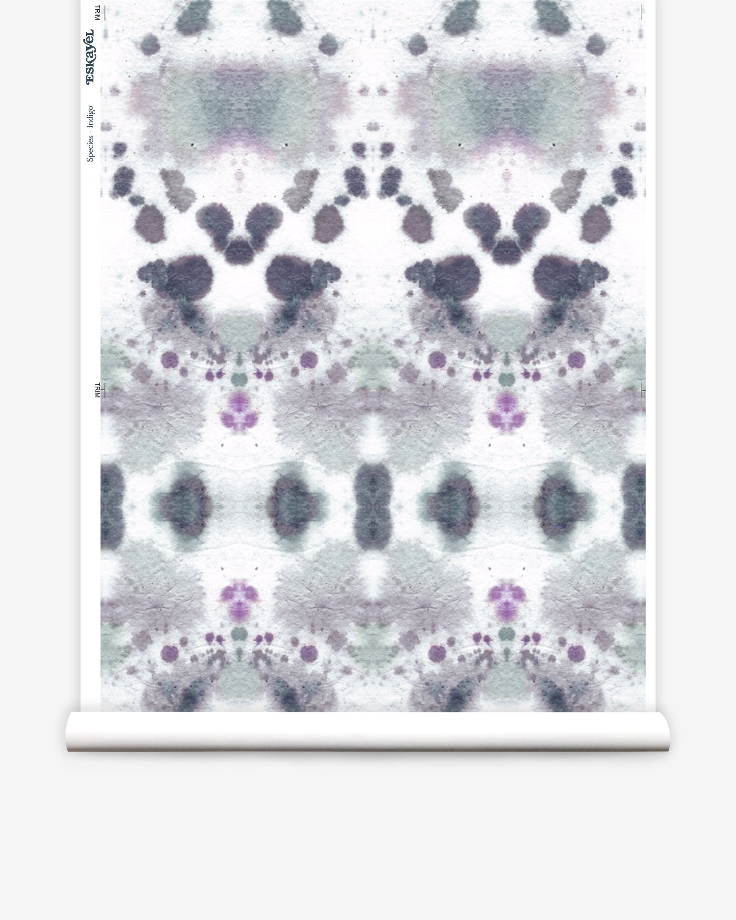 Wallpaper roll in a watercolor inkblot print in shades of purple and gray on a cream field.