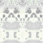 Wallpaper detail in a watercolor inkblot print in shades of blue-gray on a cream field.