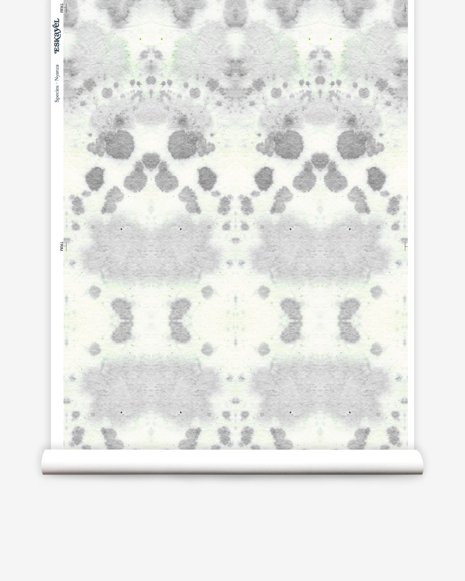 Wallpaper roll in a watercolor inkblot print in shades of blue-gray on a cream field.