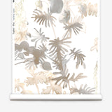 Wallpaper roll in an watercolor palm frond pattern in shades of beige and tan. 