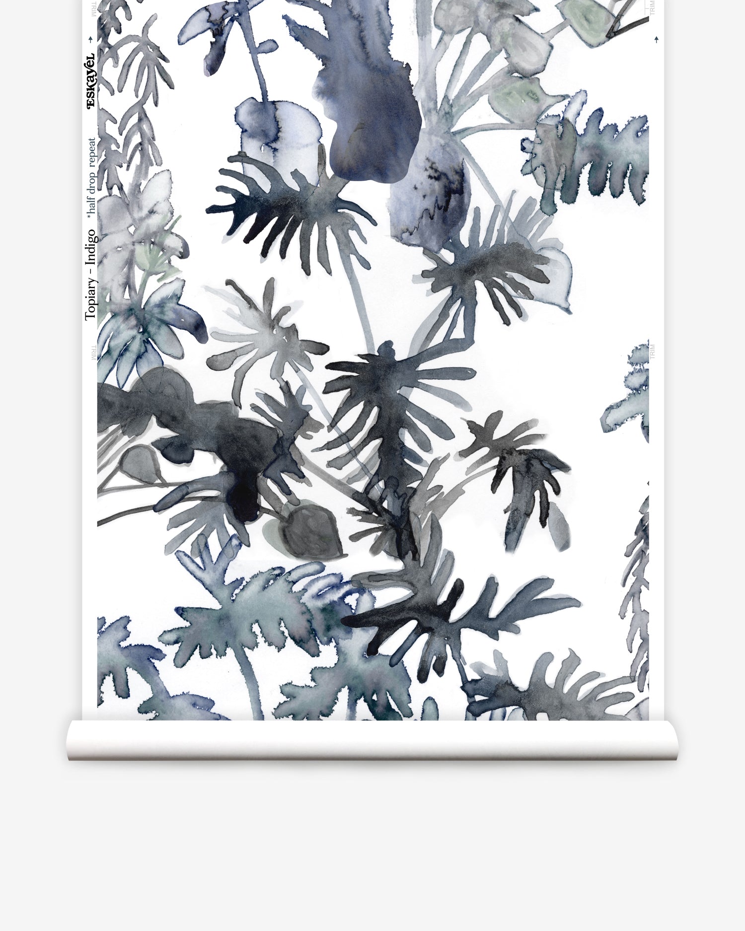 Wallpaper roll in an watercolor palm frond pattern in shades of dark blue. 