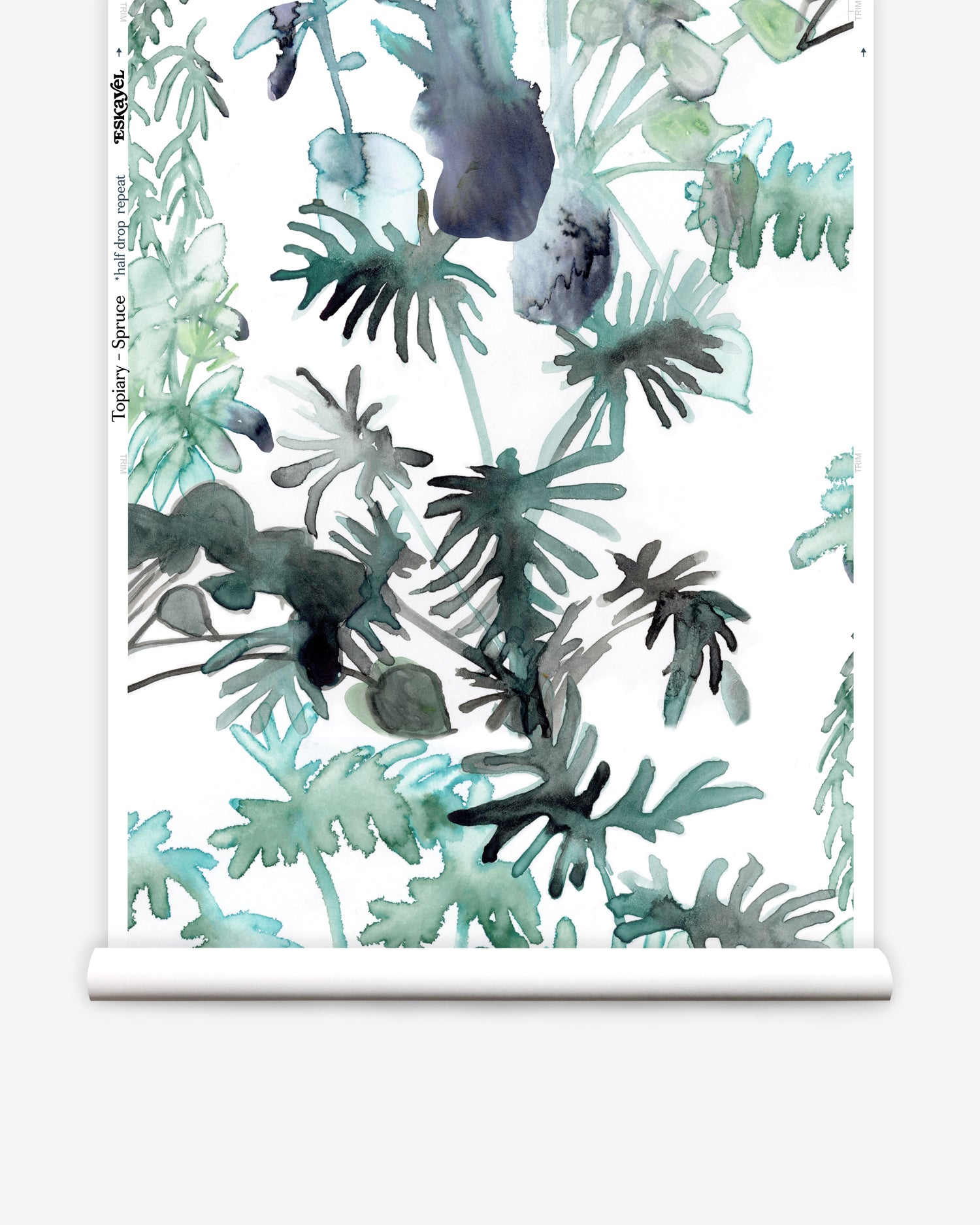 Wallpaper roll in an watercolor palm frond pattern in shades of teal and green. 