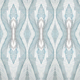 Wallpaper detail in a watercolor diamond print in shades of gray and blue on a cream field.