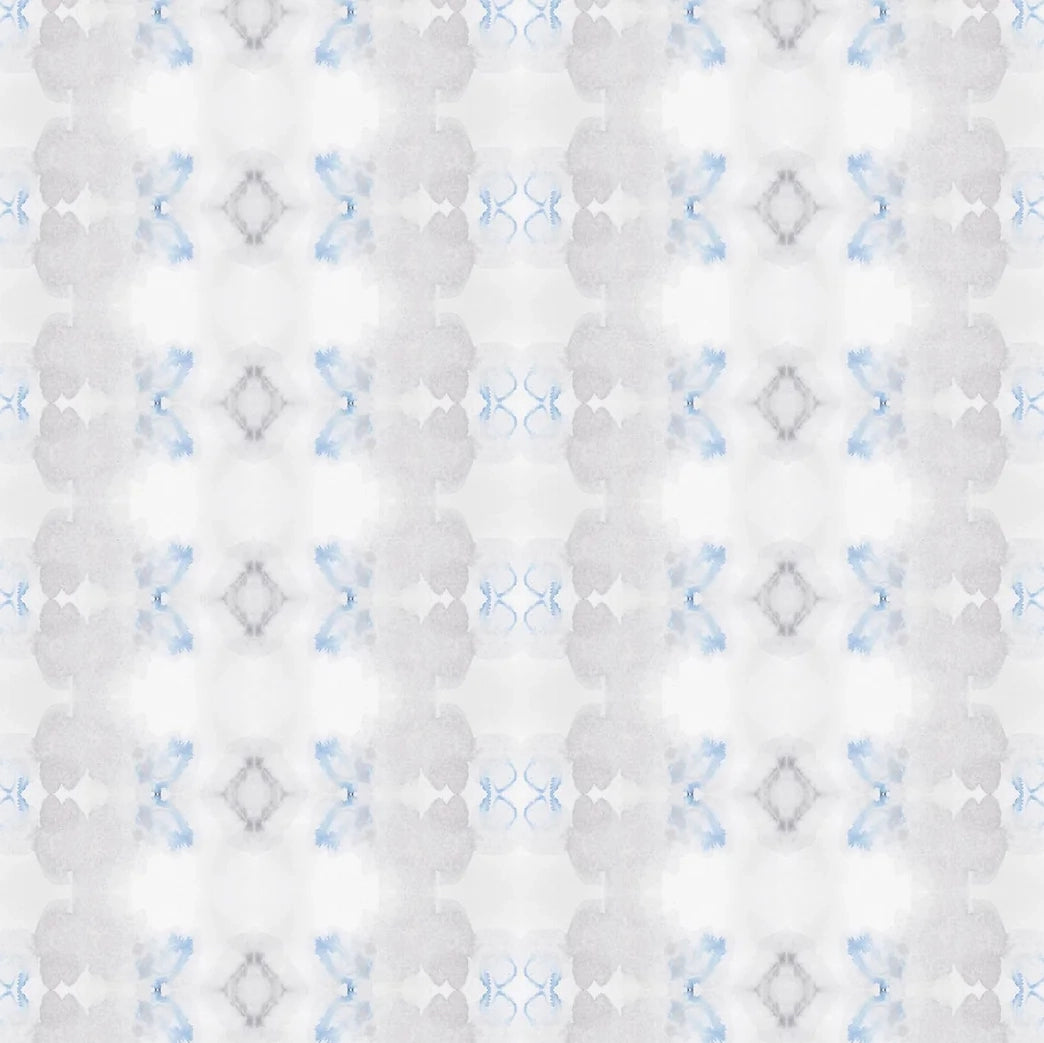 Detail of wallpaper in a striped ink blot print in shades of gray and blue on a cream field.