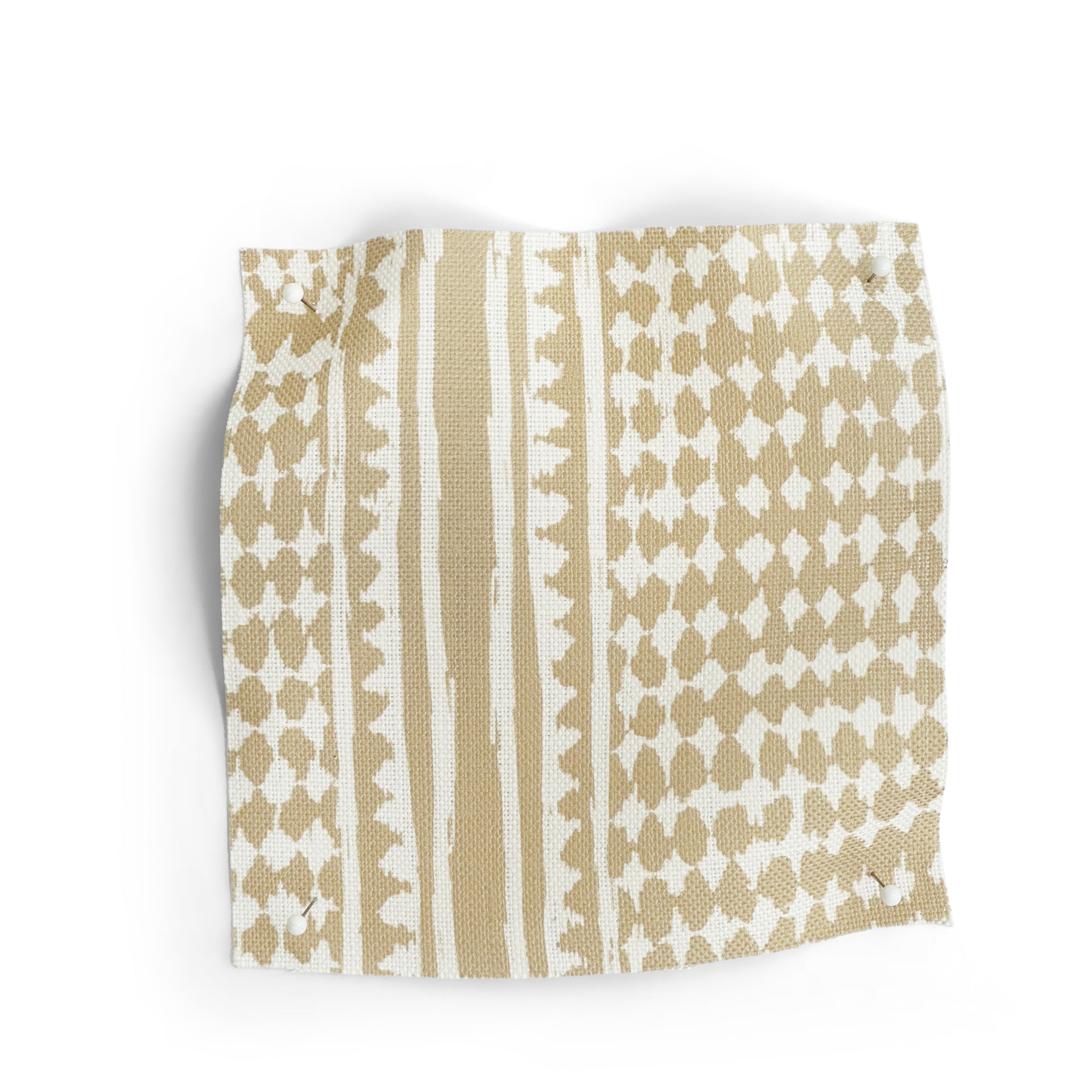 Textile with a beige and white geometric pattern on a white background