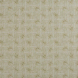 Detail of fabric in a geometric grid pattern in olive on a greige field.
