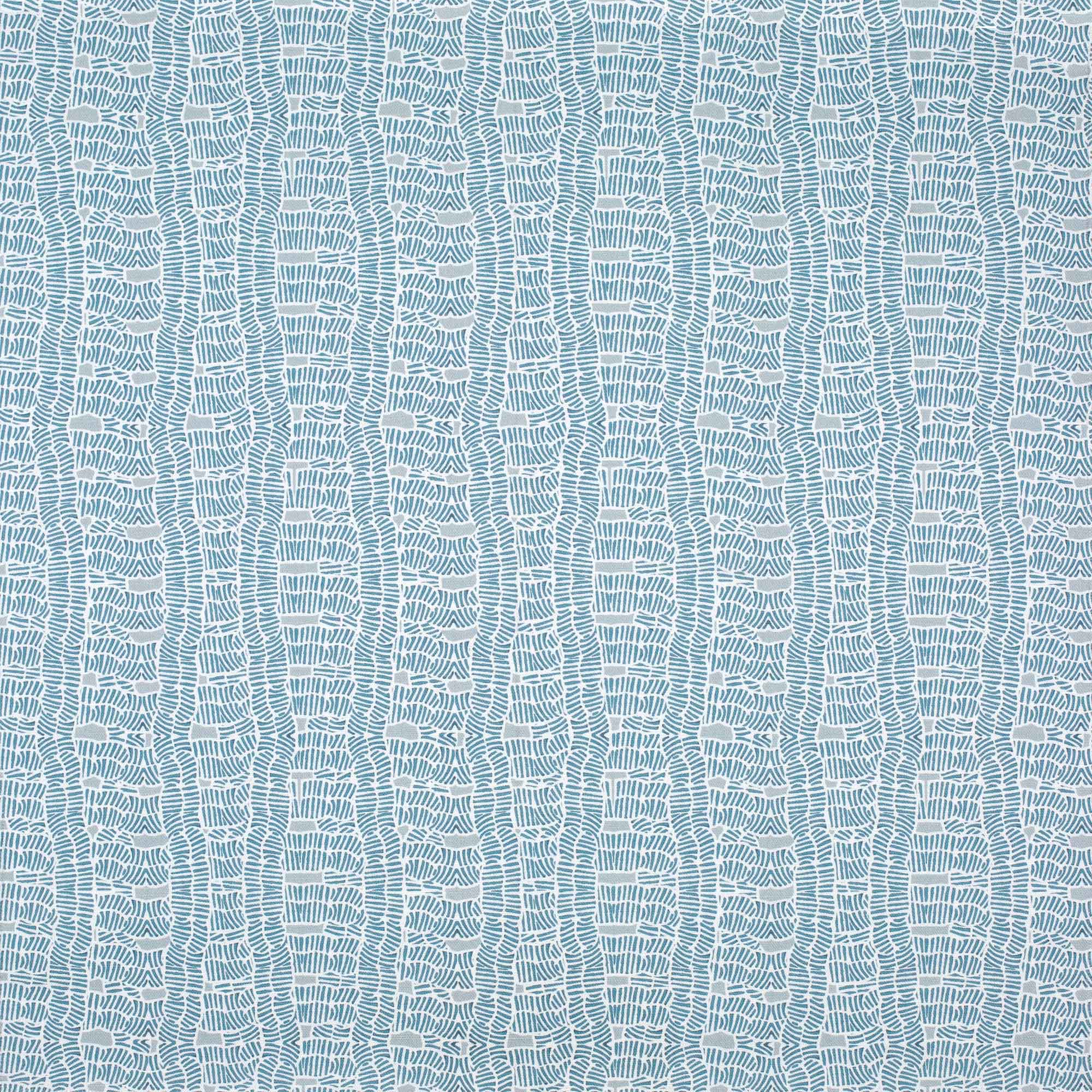 Detail of fabric in a playful curvy grid print in blue and gray on a white field.