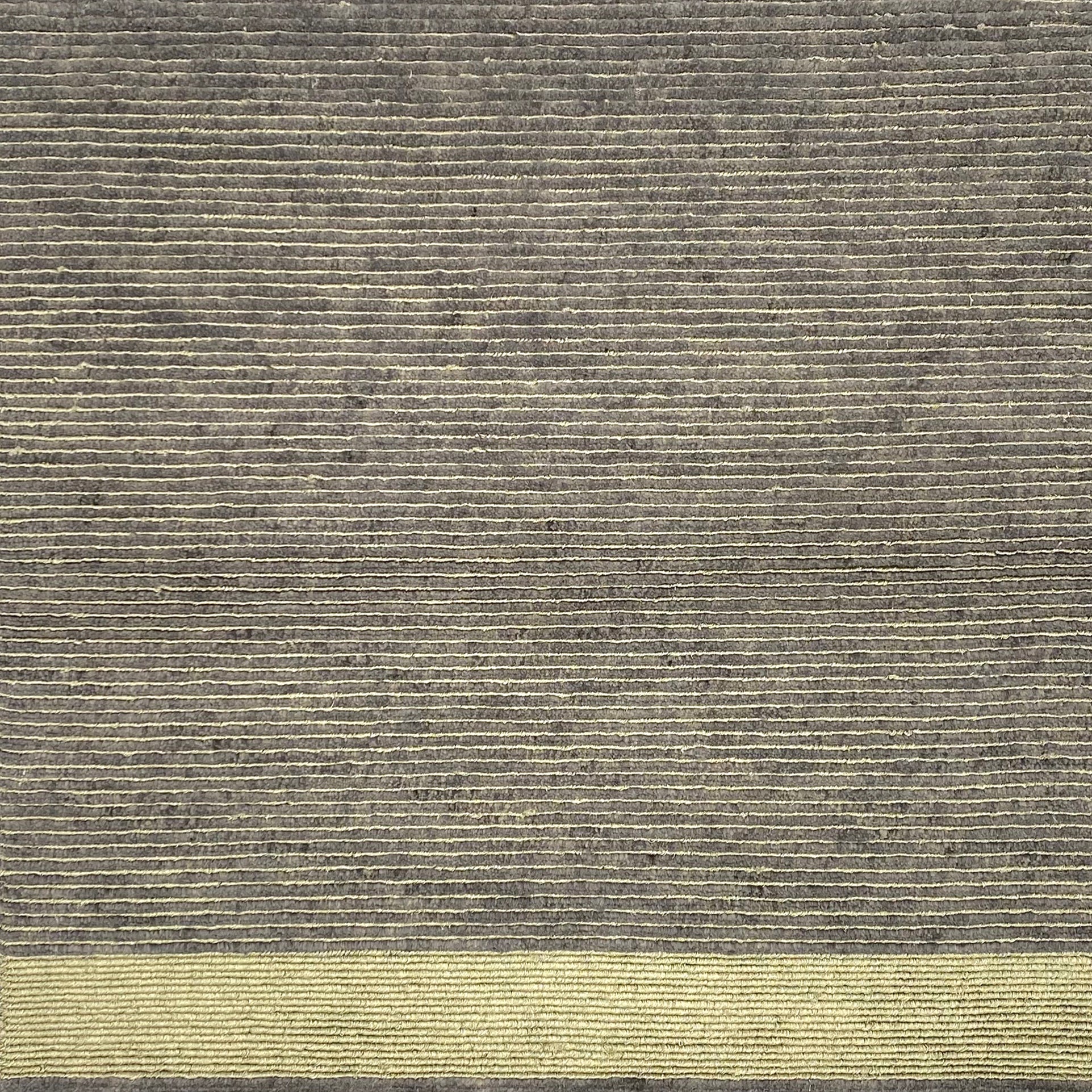 Handknotted rug in a  pewter silk rib with gold metallic stripes and border. 