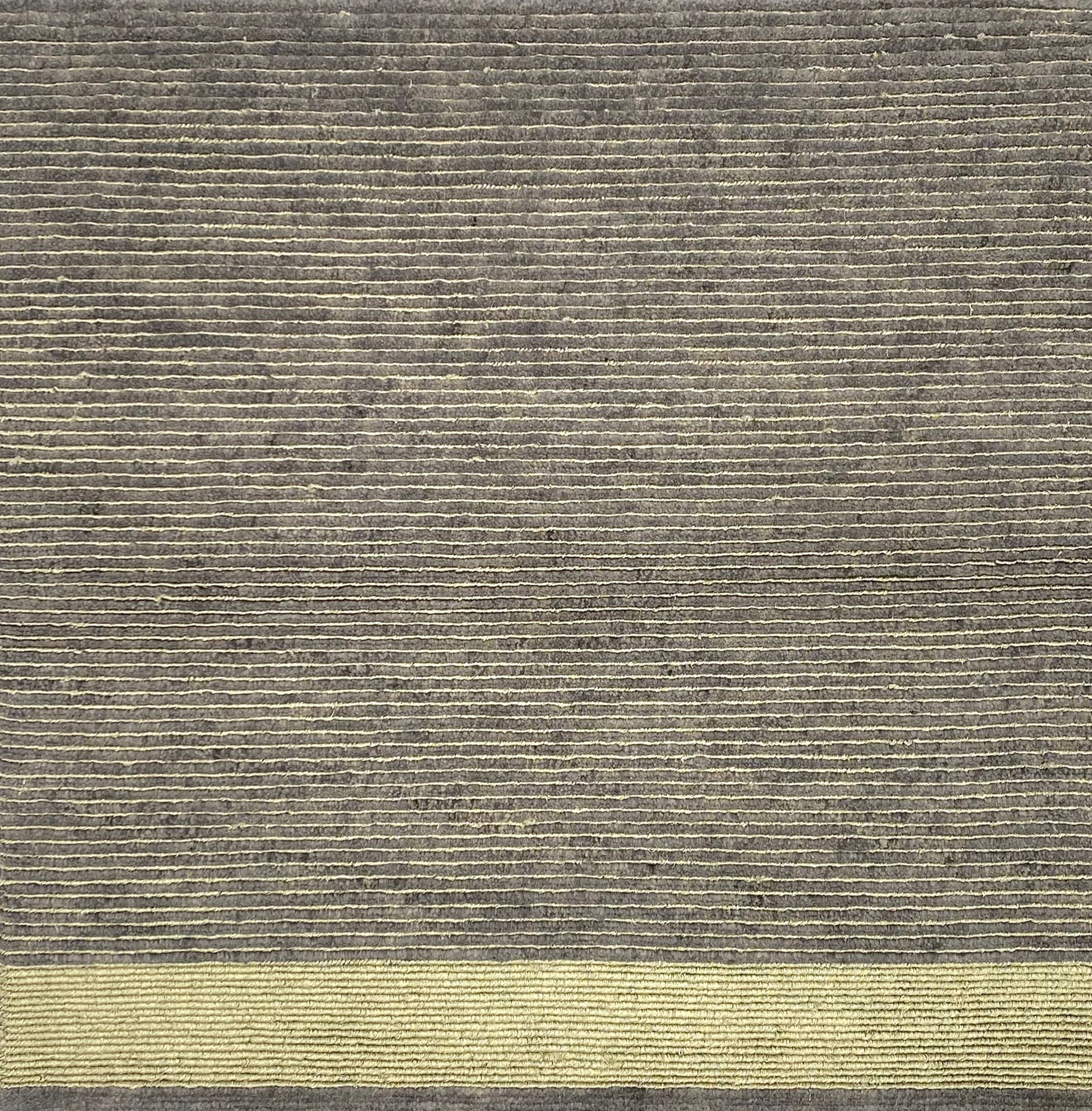 Handknotted rug in a  pewter silk rib with gold metallic stripes and border. 