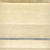 Handknoted rug in a multi width silk stripe in shades of cream with silver and taupe accents.