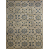 Patterned rug with geometric design on a plain background