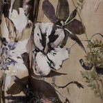 Detail of a watercolor floral mural in black and white on a sepia field 