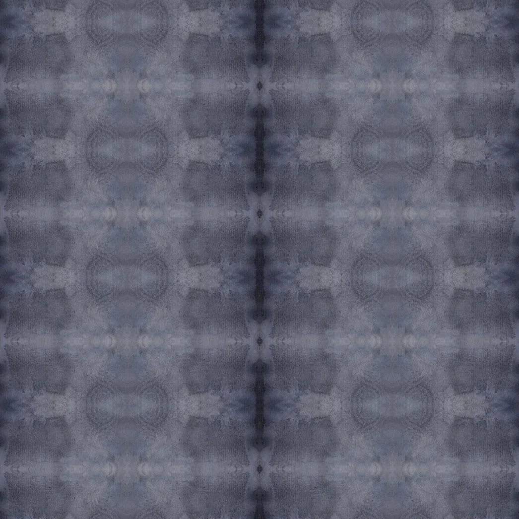Detail of wallpaper in a repeating ink blot print in navy on a charcoal field.