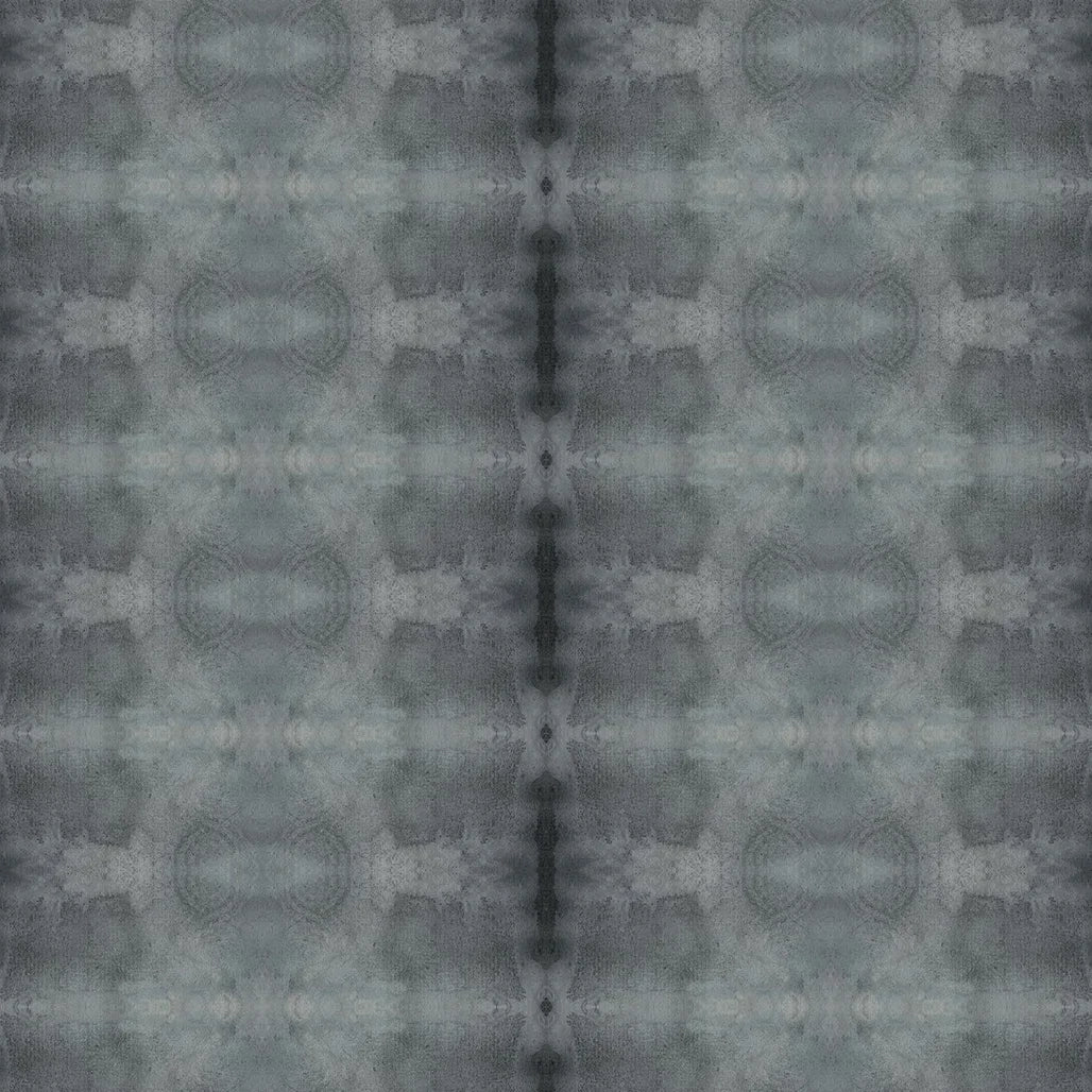 Detail of wallpaper in a repeating ink blot print in shades of gray.