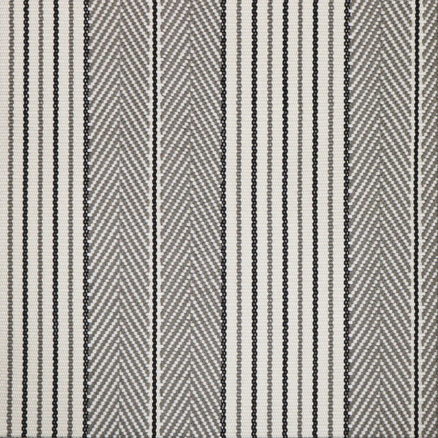 Broadloom carpet swatch in a herringbone striped pattern in a light grey black design