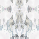 Detail of wallpaper in a watercolor paint blotch print in shades of gray and blue on a white field.