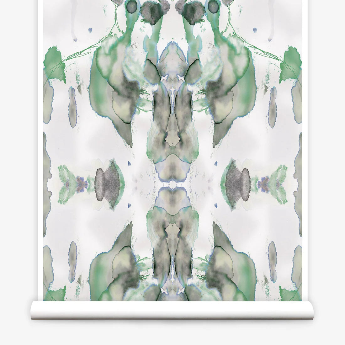 Partially unrolled wallpaper yardage in a watercolor paint blotch print in shades of gray and green on a white field.