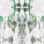 Detail of wallpaper in a watercolor paint blotch print in shades of gray and green on a white field.