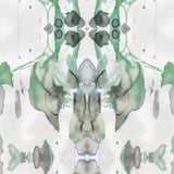 Detail of wallpaper in a watercolor paint blotch print in shades of gray and green on a white field.