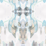 Detail of wallpaper in a watercolor paint blotch print in shades of gray, blue and tan on a white field.