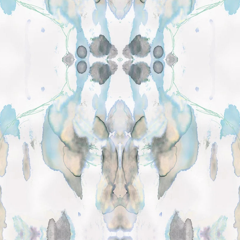 Detail of wallpaper in a watercolor paint blotch print in shades of gray, blue and tan on a white field.