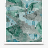 Roll of wallpaper with abstract watercolor design in shades of teal