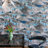 Room interior with abstract patterned wallpaper, table, and chairs.