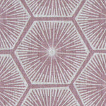 Fabric in a geometric lattice print in white on a light purple field.