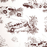 Detail of wallpaper in a playful illustrated car crash print in brown on a white field.