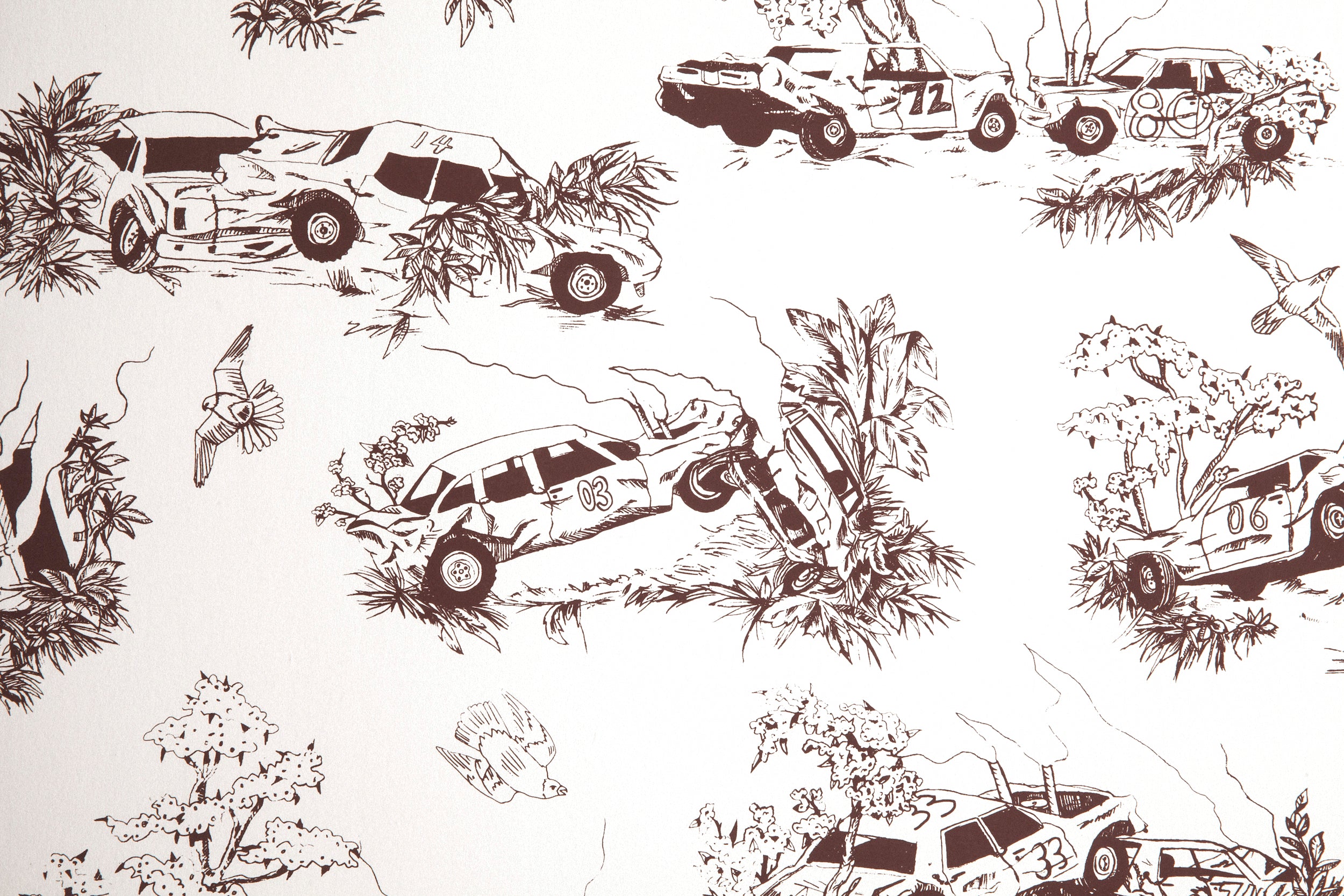 Detail of wallpaper in a playful illustrated car crash print in brown on a white field.