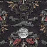 Detail of fabric in a playful snake, plant and moon print in shades of red, brown and gray with rhinestone accents.