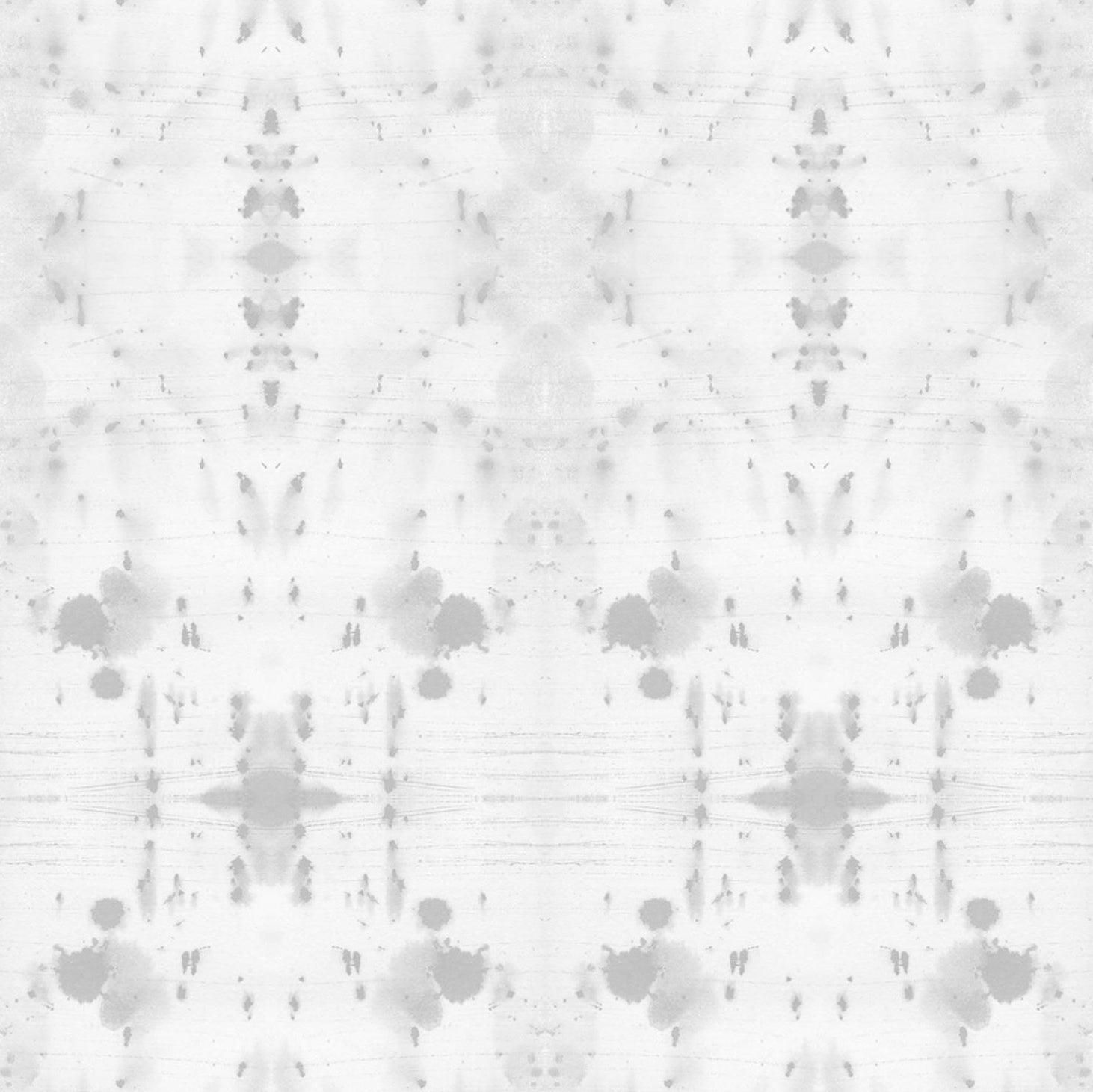 Detail of wallpaper in a watercolor ink blot print in gray on a white field.