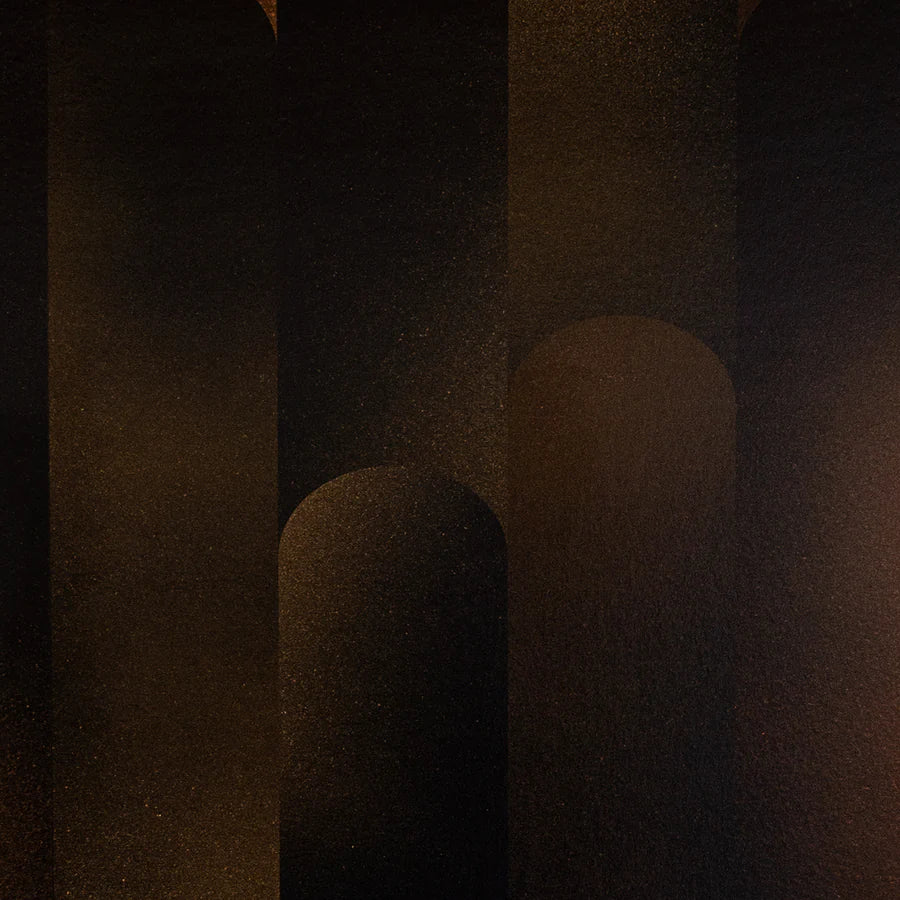 Detail of wallpaper in a curvilinear geometric print in shades of black and brown.