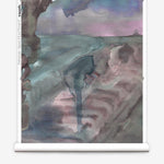 Partially unrolled wallpaper yardage in a watercolor painterly print in shades of pink, turquoise and gray.