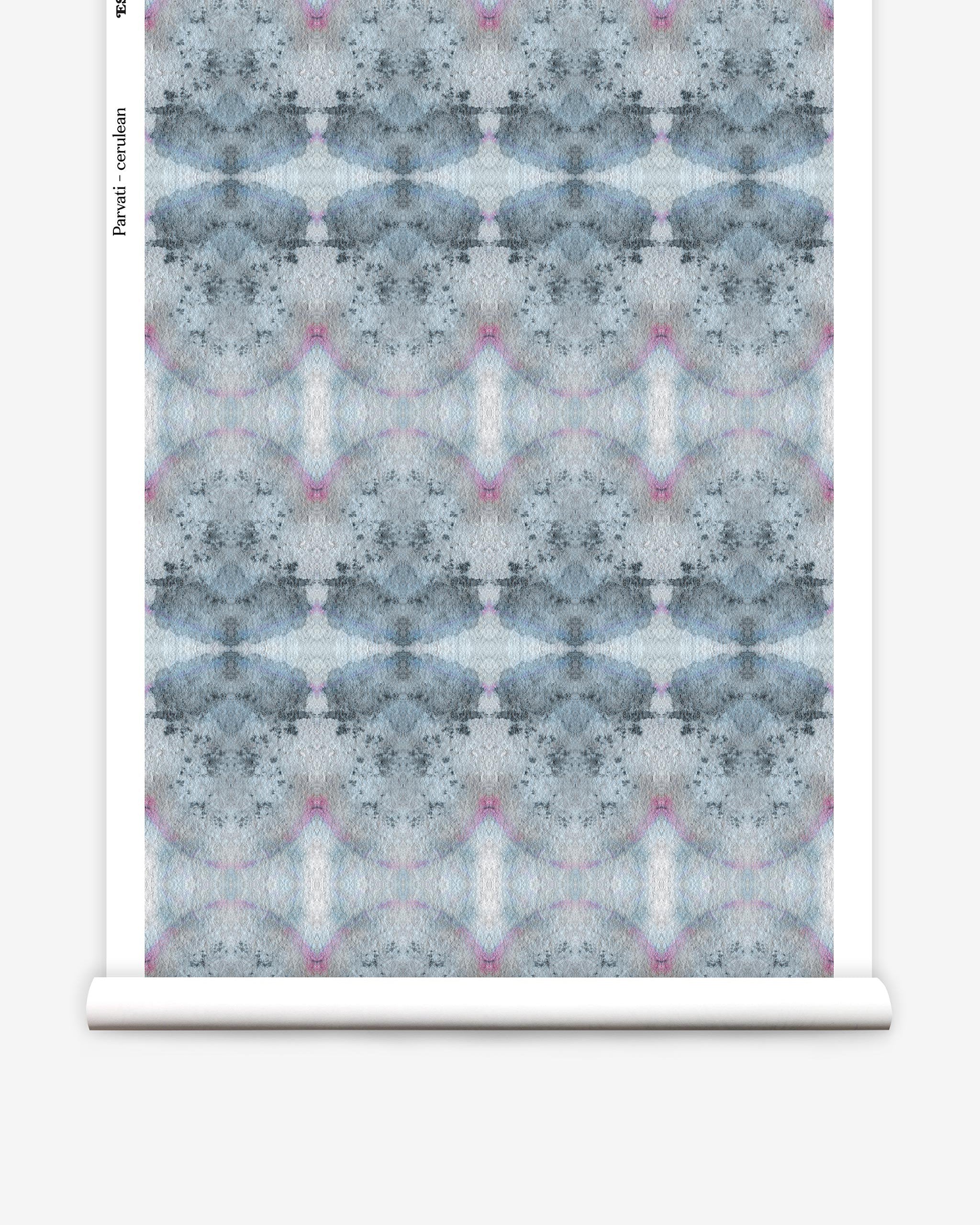 Partially unrolled wallpaper yardage in a watercolor ink blot pattern in shades of gray, blue and pink.