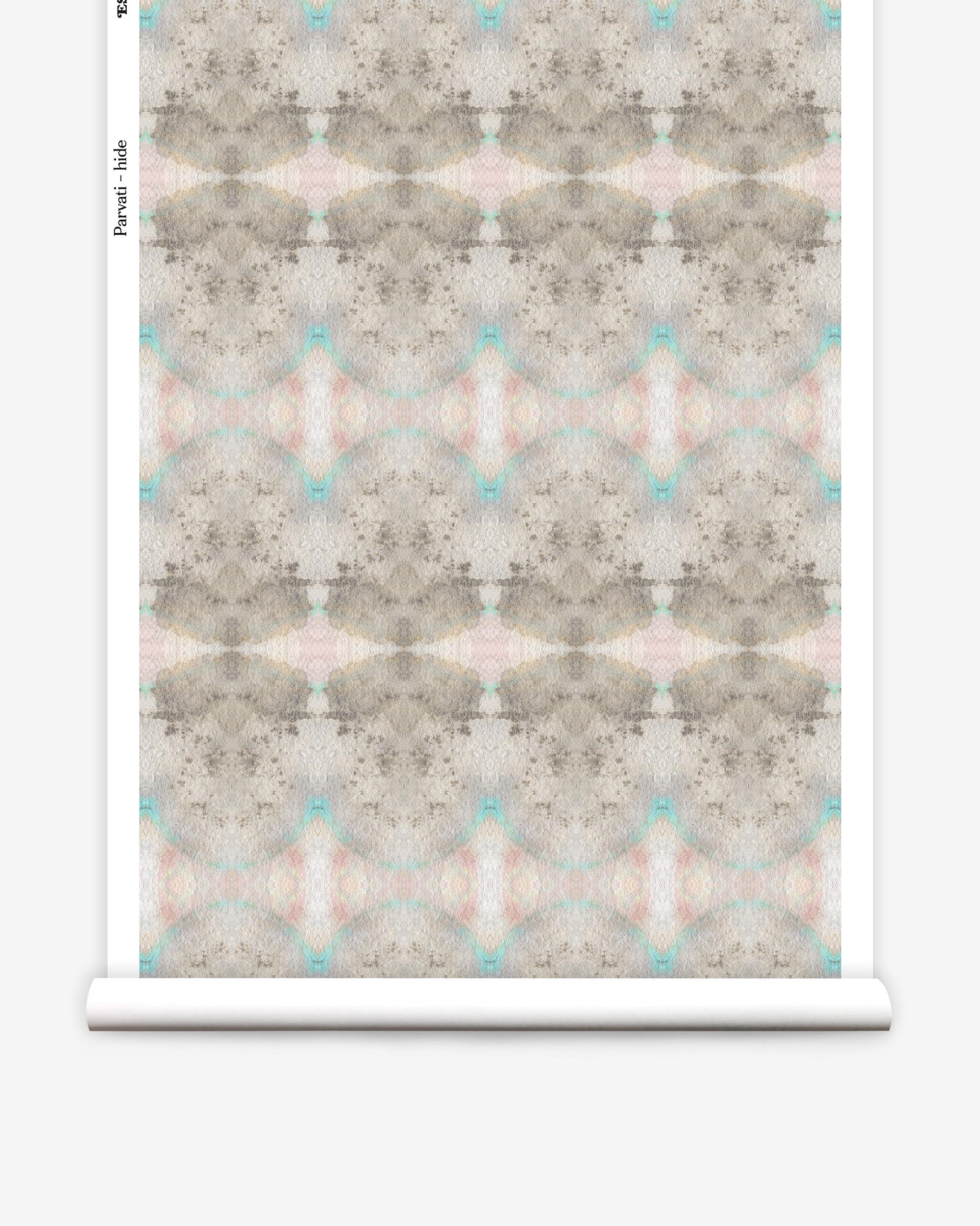 Partially unrolled wallpaper yardage in a watercolor ink blot pattern in shades of tan, turquoise and pink.