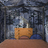 Bedroom with patterned wallpaper and wooden dresser