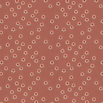 Scaled-out view of fabric in a minimal floral print in shades of pink, red and blue on a maroon field.