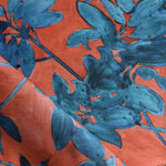Blue floral pattern on a red background