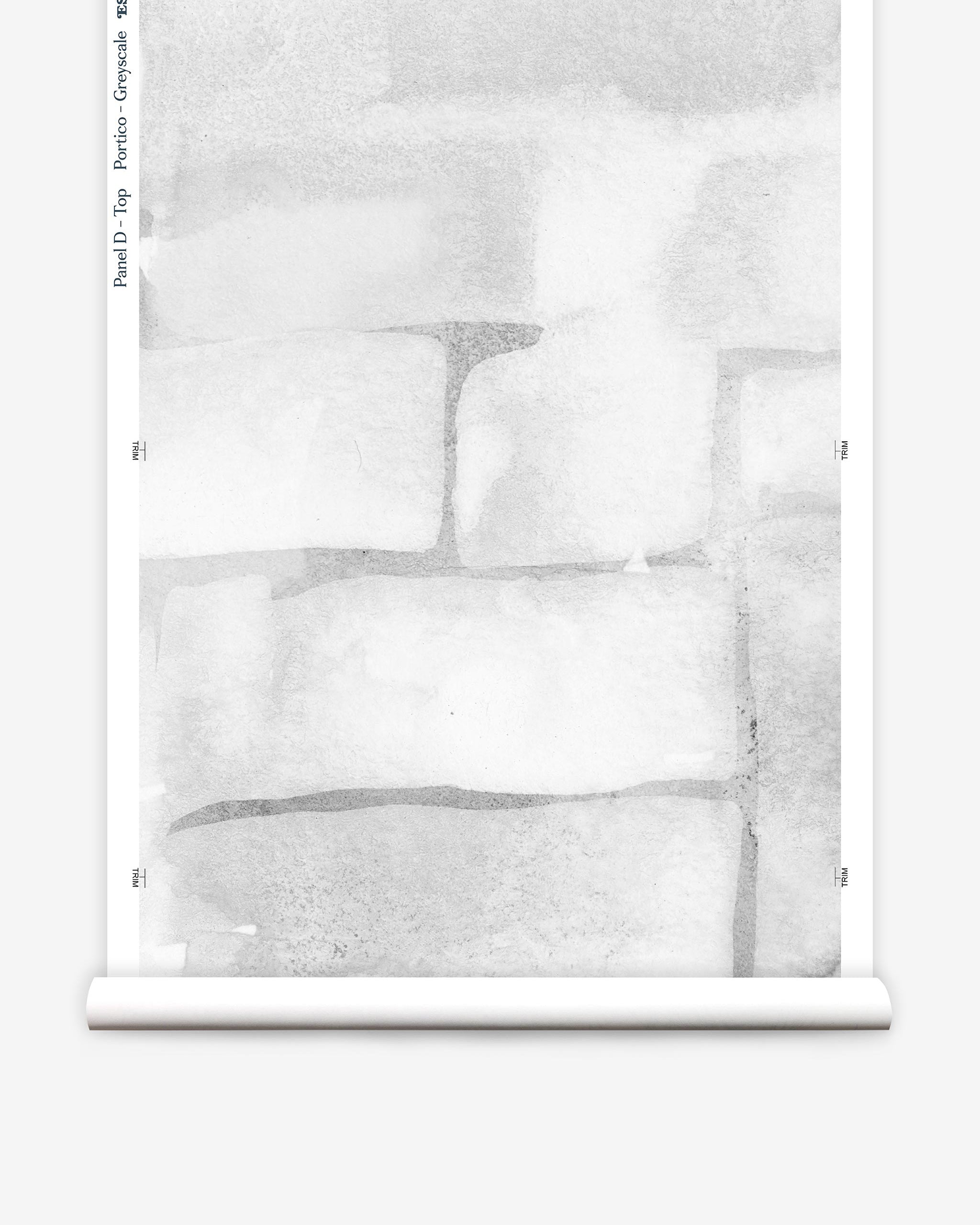 Partially unrolled wallpaper yardage in a watercolor grid print in shades of gray and white.